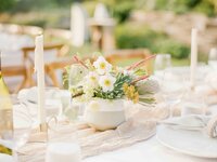 yellow and white floral centerpiece