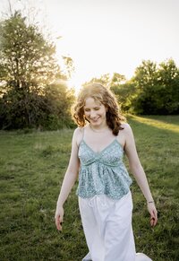 senior girl in a field in flowermound texas