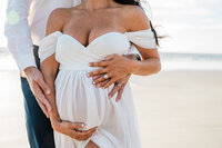 Maternity session in downtown Savannah, Ga for young mom, dad, and little girl.