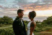 bride and groom kissing on stairs
