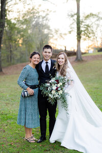 Eleanor Stenner with bride and groom at Birmingham wedding 