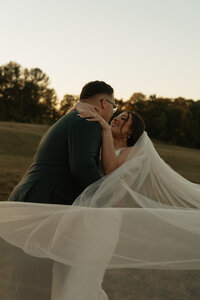 bride and groom kissing