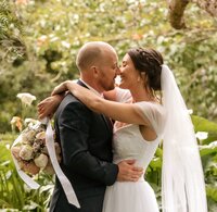 Bride and groom celebrating small wedding NZ