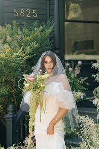 Bride wearing a two layer waterfall style veil