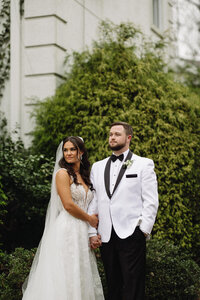 Couple enjoying a peaceful moment alone, captured beautifully on their wedding day.