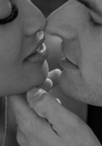 Close-up black and white photo of a couple almost kissing, capturing intimate love and connection — perfect for elopement or wedding photography storytelling.