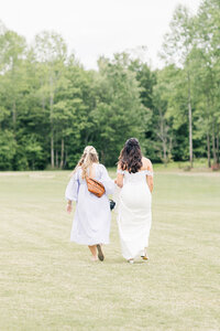 Bride and groom walk up memorial steps at their DC wedding