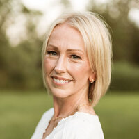 Headshot of Ashley Livingston, spiritual coach, energy healer, and founder of Moon School, sharing testimonial for Moonstone Creative branding services