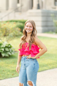 high school senior posing at golden hour