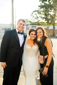 Eleanor Stenner with bride and groom at Birmingham wedding 
