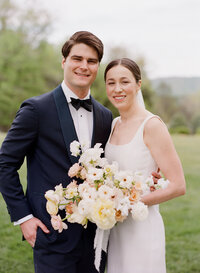 Bride and groom walk up memorial steps at their DC wedding