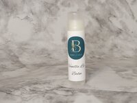Circular image of Berry and Balm vanilla chapstick with a cute label