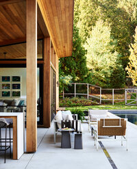 Hingham pool house designed by Boston interior designer Sarah Scales with Estes Twombly and Titrington Architects Inc. A modern, family-friendly space with modern furniture and style.