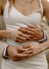photo of braid and groom embracing taken by Adventure wedding photographer