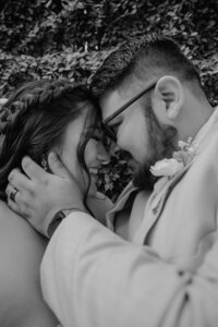 couple touches forheads in san diego wedding