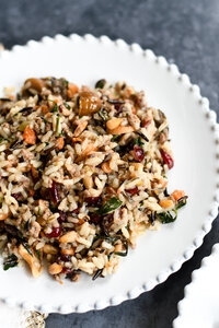 Rice stuffing on a white round plate. 