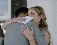 Bride and groom sharing a joyful moment on their wedding day in Spokane, Washington, with a documentary-style photography approach.