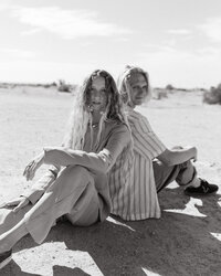 black and white engagement photo of couple at Salvation Mountain