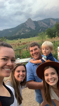 family gathers for a selfie 