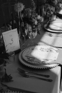 A sun-drenched wedding tablescape from an indoor reception in Milwaukee, styled with elevated details and natural light. Photographed by Alexia Rodriquez, a luxury wedding photographer capturing refined, editorial-inspired celebrations.