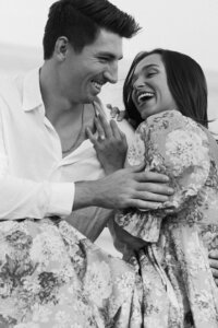 Couple shares a laugh together during their engagement session.