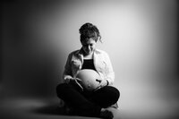 black and white studio maternity portrait