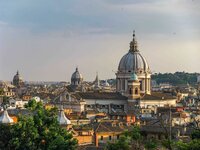 Overlooking the domes and spires of Rome, Italy in golden afternoon light  ©Stephanie Dosch | theViatrix Luxury Travel