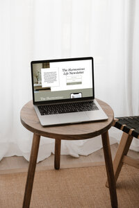 Aubre holding color swatches and smiling