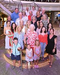 family photo on cruise ship on vacation planned by luxury travel concierge GG Mack