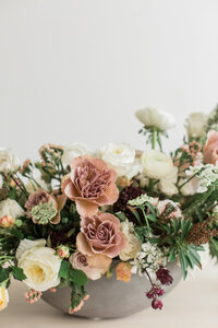 blush, white, and green floral bridal arrangement