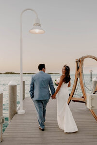 bride and groom holding eachother