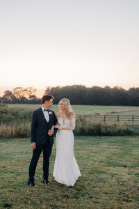 couple-walking-arm-in-arm