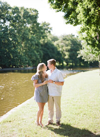 dallas couple in wedding engagement session by the water