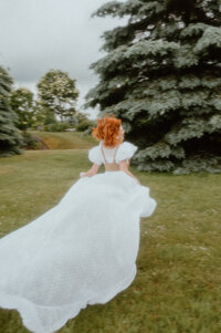 Black and white portrait of a bride in an elegant gown