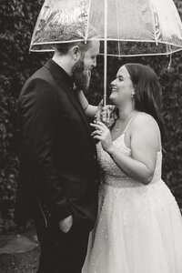 Rainy Day Wedding Under Umbrella