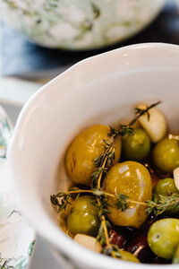 Close up view of olives in a bowl