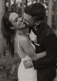 Married couple on their wedding day taking photos at Pinewood Events Center in Cambridge, Minnesota
