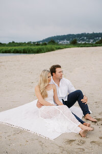 Montauk engagement photo on the beach captured by Hamptons wedding photographer Myra Roman