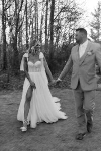 Black and white motion blur photo of bride and groom on their wedding day in Montana