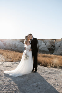 couple engagement photography in museum with wall art