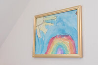 Child's watercolor of a colorful rainbow