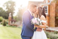 bride and groom kissing