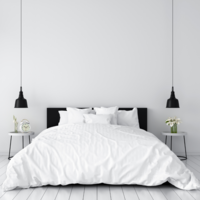 Black bed frame with all white bed sheets with two black hanging light fixtures