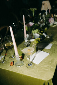 martini glass and candles on the table of a wedding reception in jekyll island, georgia