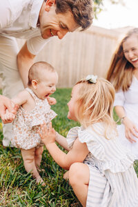 family of 3 together in a family photo