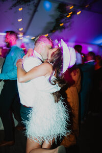 Bride and groom on dance floor at their Crested Butte wedding.