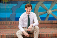 A guy taking his senior portrait in  Columbia, South Carolina
