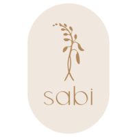 Submark logo for Sabi Lifestyle Coaching with the name Sabi and a wisteria vine on an oval background.