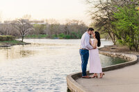couple pose together during their maternity photoshoot with Blair Davis Photography