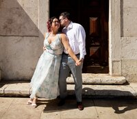 Newlyweds showcasing their dance moves for a honeymoon photoshoot